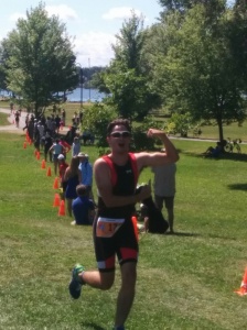 Cam at the end of his first tri of the year.  But seriously... who has this much energy at a triathlon finish?!?!